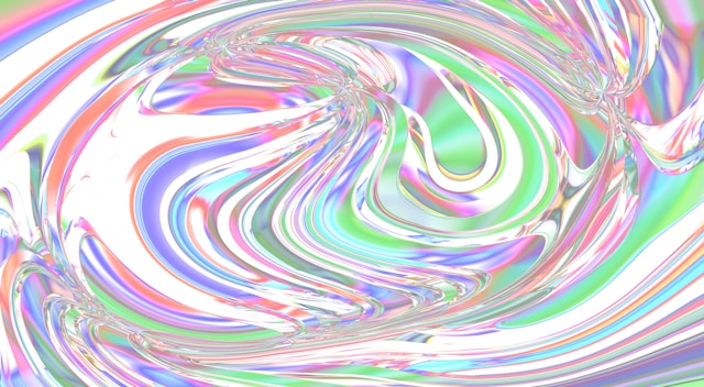 A blurry image of a pink and blue background